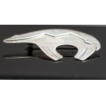 Silver bear brooch.