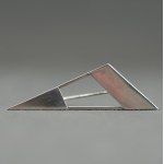 Modernist brooch in the shape of a triangle.