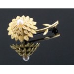 Large, beautiful gilded brooch. Flower with a pearl.