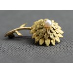 Large, beautiful gilded brooch. Flower with a pearl.