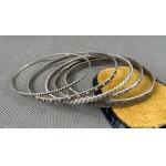 Warmet. Set of five sterling silver bracelets. [2]