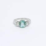 Silver ring with naturalized white and green Sapphires