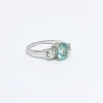 Silver ring with naturalized white and green Sapphires