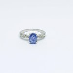 Silver ring with natural Tanzanites and white Sapphires