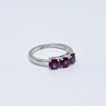 Silver ring with pink Topazes