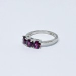 Silver ring with pink Topazes