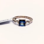 Silver ring with natural topaz and zircons