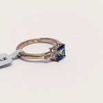 Silver ring with natural topaz and zircons
