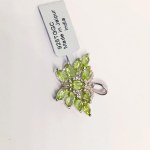 Silver pendant with natural peridots and topazes