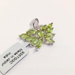 Silver pendant with natural peridots and topazes