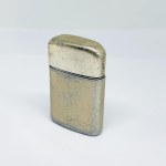 A pre-1949 aluminum Ronson Typhoon lighter.