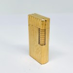 Gold-plated engraved Dunhill lighter