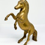 Brass statue depicting a horse