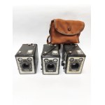 Three Kodak Brownie cameras (2xModel E, 1xModel D), one in a case