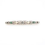Brooch with emerald and brilliant-cut diamonds