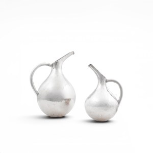 Two Lalaounis beak cans