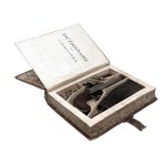 Flintlock pocket pistol in a book imitation case