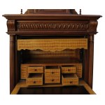 Secretary from the Historicism period with a clock