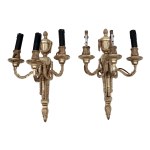 An excellent pair of three-arm wall sconces from the time of Louis XVI.