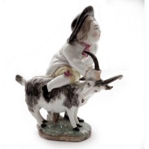 Boy playing with a goat in Höchst
