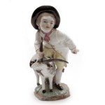 Boy playing with a goat in Höchst