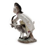 Boy playing with a goat in Höchst