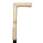 Spatula with carved bone handle