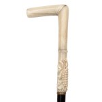 Spatula with carved bone handle