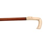 Spatula with carved bone handle