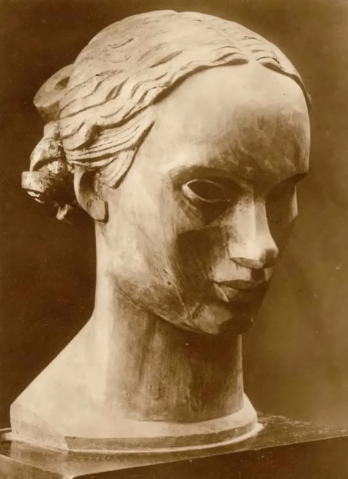 Xawery Dunikowski. Głowa kobiety (drzewo złocone. 1925).